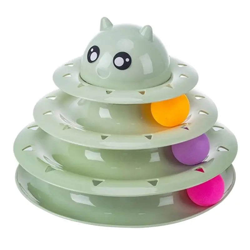 Jouet vert surmonté d’une balle rose de Catower : Un jeu interactif pour stimuler les capacités des chats
