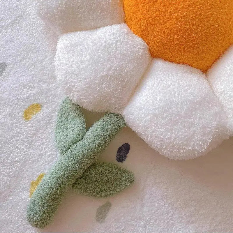Doux oreiller blanc avec fleur pour une touche esthétique et confortable dans votre maison