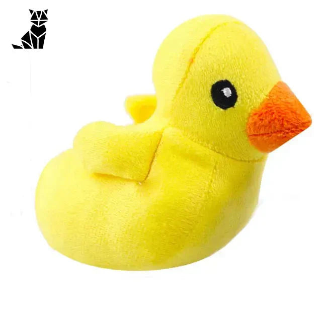 Jouet couineur canard jaune sur surface blanche - Jouet couineur pour chien, peluche tournesol